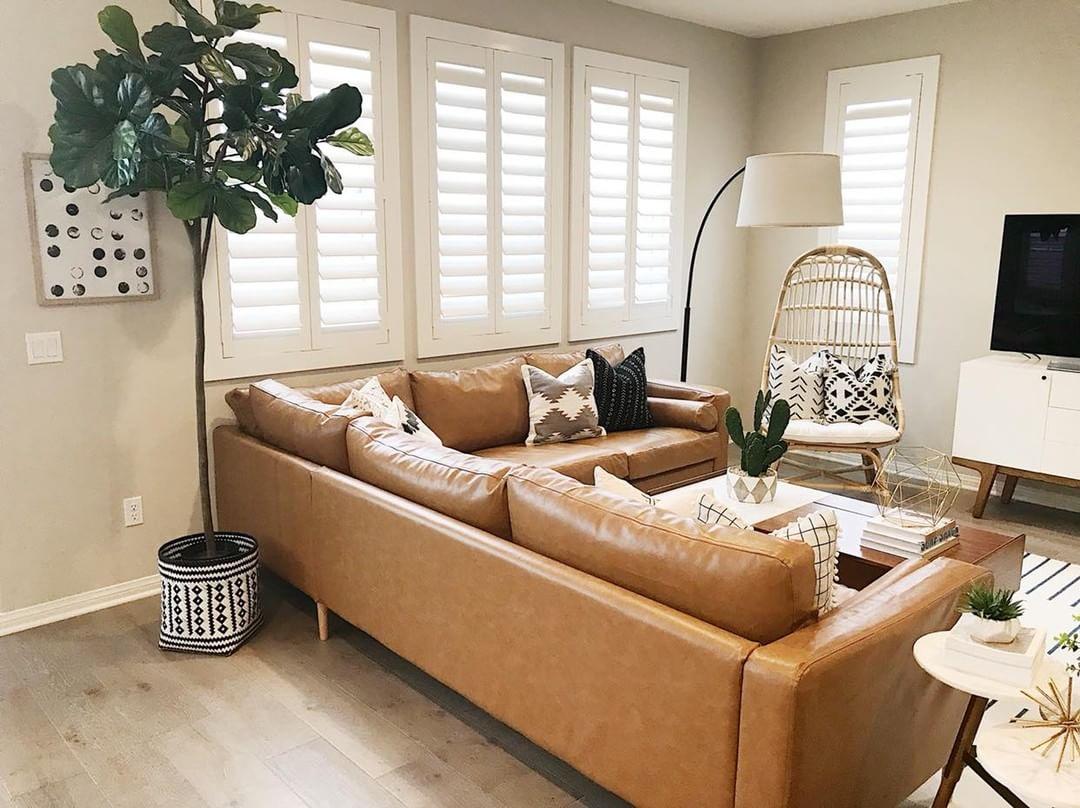 Warm living room with Polywood shutters in Las Vegas.